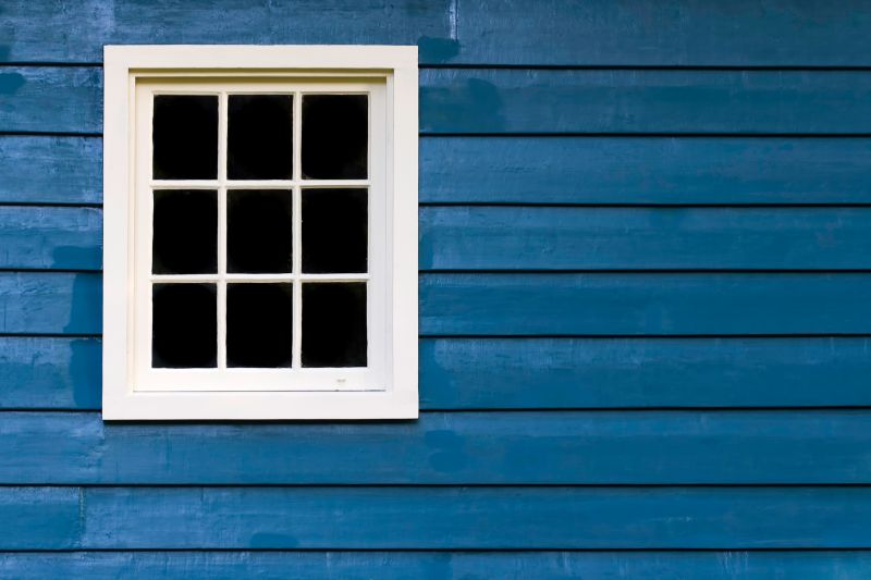 Blue Siding Installation
